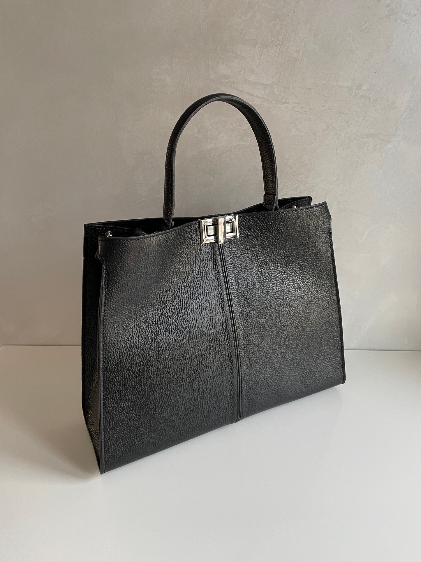 BORSA A MANO FLAVIA IN PELLE