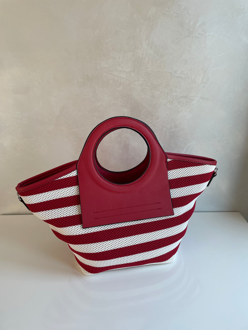 BORSA A MANO LIA A RIGHE BIANCHE E ROSSE