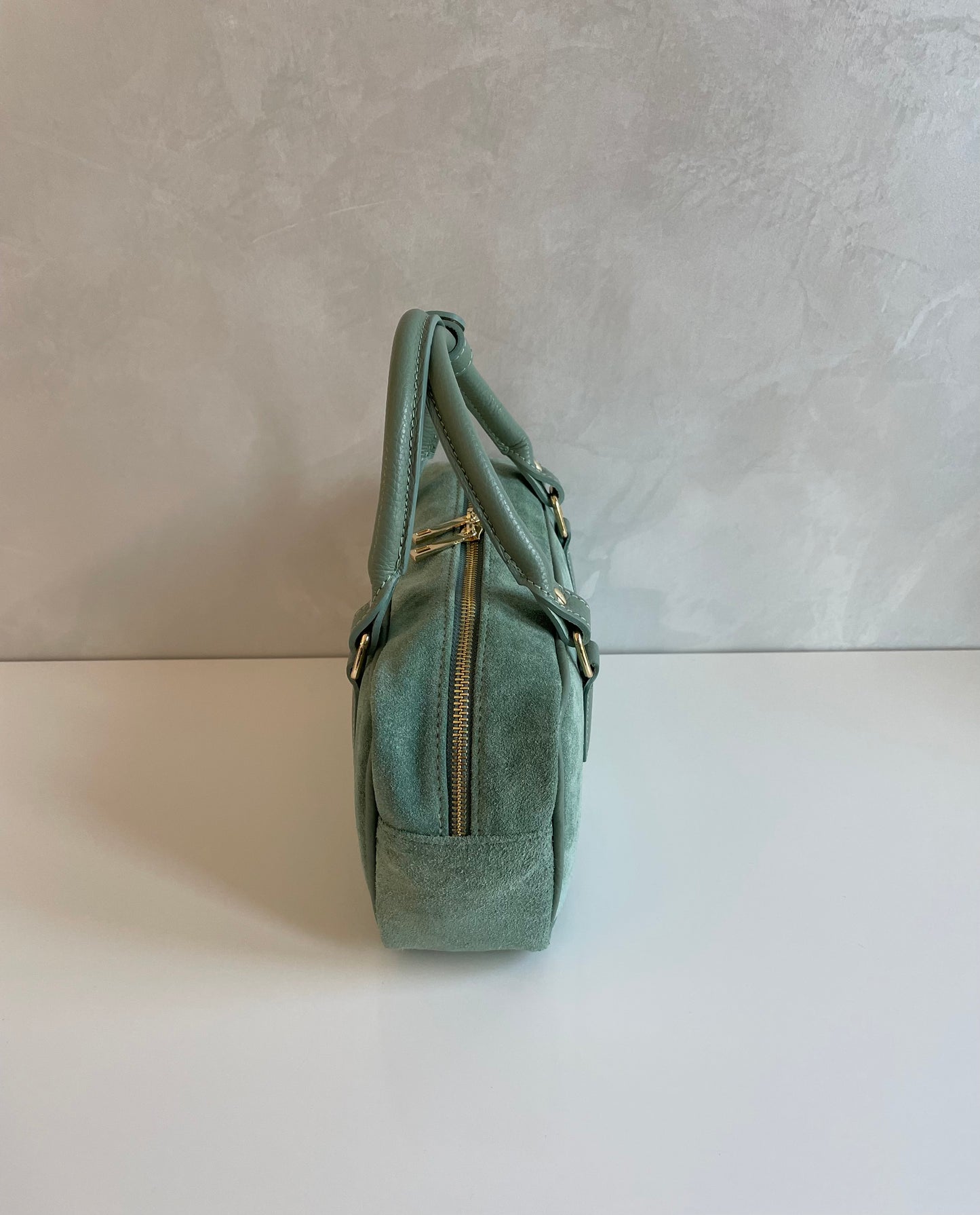 BAULETTO A MANO AURY IN CAMOSCIO CON TRACOLLA